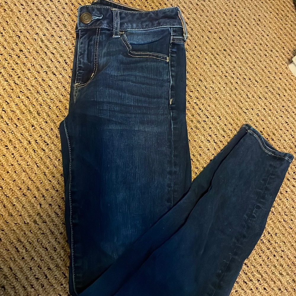 dark wash next level stretch jeans, size 4, american eagle